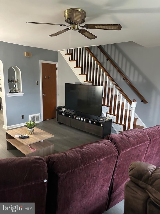3432 Hartel Ave, Philadelphia, PA 19136 - living room featuring wood finished floors, a ceiling fan, and stairs