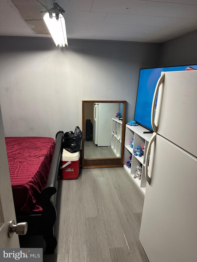 3432 Hartel Ave, Philadelphia, PA 19136 - bedroom featuring freestanding refrigerator and wood finished floors