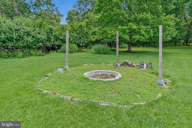 29 Cedar Dr, Sterling, VA 20164 - view of grassy yard featuring a fire pit