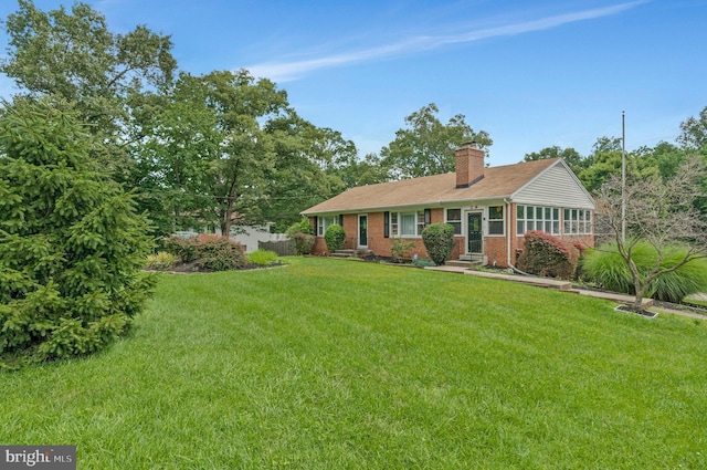 29 Cedar Dr, Sterling, VA 20164 - single story home featuring brick siding, a chimney, and a front lawn
