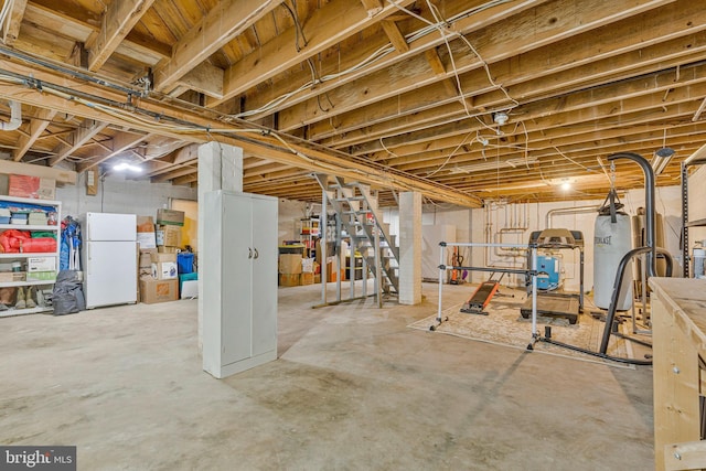 29 Cedar Dr, Sterling, VA 20164 - unfinished below grade area with freestanding refrigerator and electric water heater