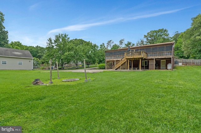 29 Cedar Dr, Sterling, VA 20164 - view of grassy yard featuring a sunroom, stairway, and a deck