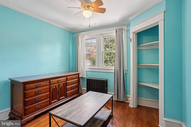 114 Walsh Rd, Lansdowne, PA 19050 - office featuring radiator heating unit, crown molding, ceiling fan, and dark wood-style floors
