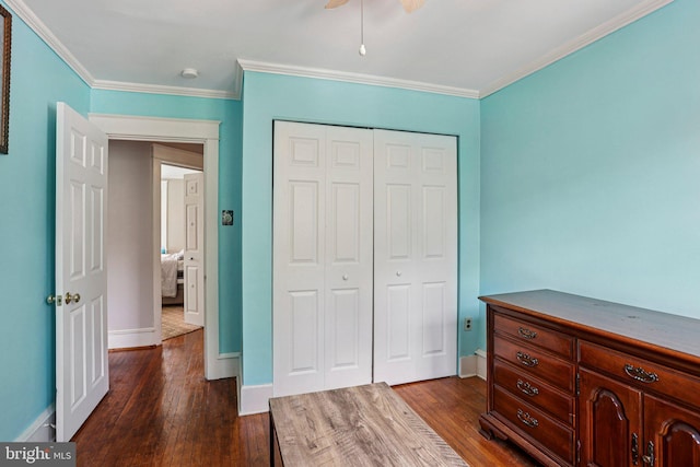114 Walsh Rd, Lansdowne, PA 19050 - bedroom with dark wood-style floors, ornamental molding, a closet, and ceiling fan