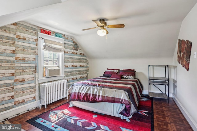 114 Walsh Rd, Lansdowne, PA 19050 - bedroom featuring radiator, lofted ceiling, wood walls, a ceiling fan, and an accent wall