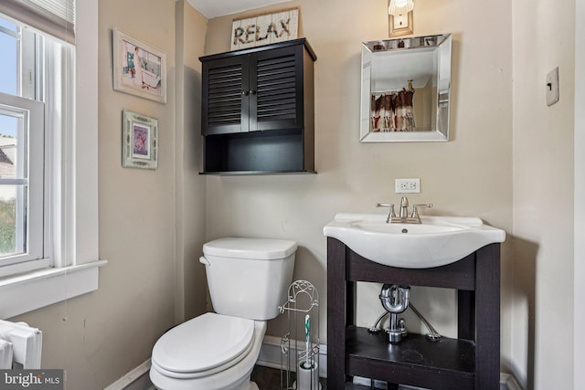 114 Walsh Rd, Lansdowne, PA 19050 - half bathroom featuring toilet and radiator heating unit