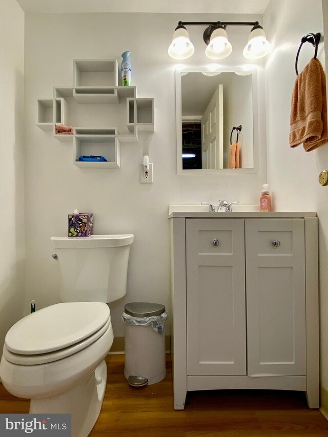 2634 Yorkway, Baltimore, MD 21222 - half bath featuring vanity and wood finished floors
