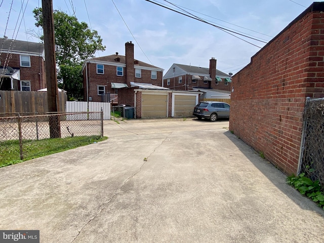 2634 Yorkway, Baltimore, MD 21222 - view of concrete driveway featuring a residential view