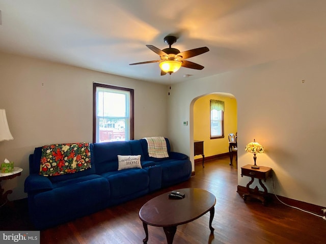 2634 Yorkway, Baltimore, MD 21222 - living area featuring plenty of natural light, arched walkways, a ceiling fan, and wood finished floors