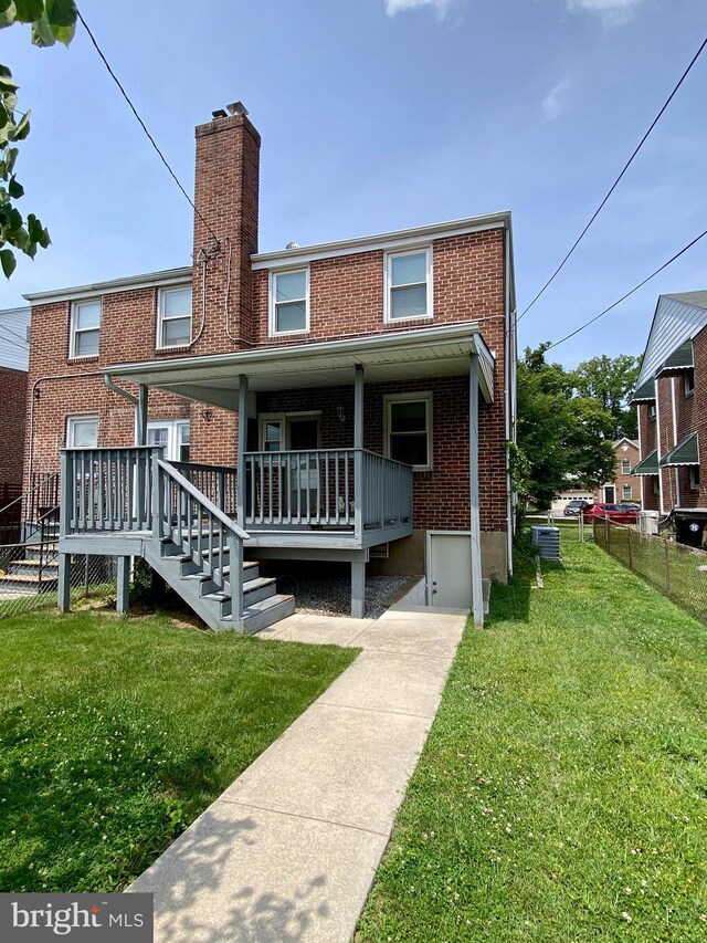 2634 Yorkway, Baltimore, MD 21222 - rear view of property featuring brick siding and a chimney