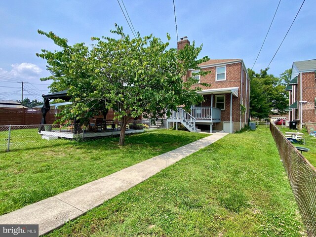 2634 Yorkway, Baltimore, MD 21222 - rear view of house with brick siding and a chimney