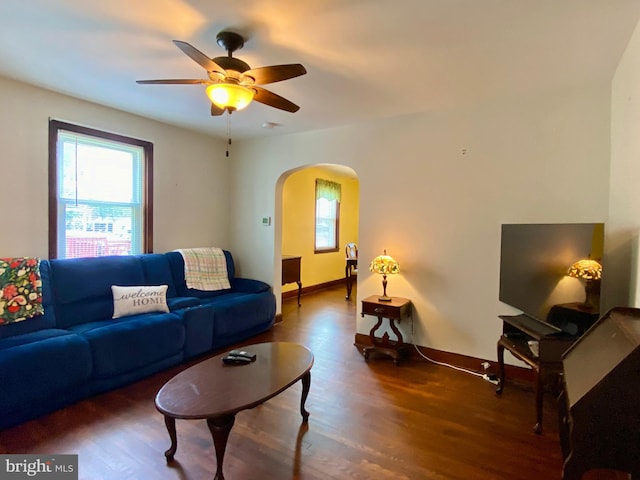 2634 Yorkway, Baltimore, MD 21222 - living room featuring arched walkways, wood finished floors, and ceiling fan