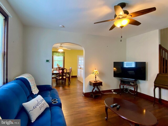 2634 Yorkway, Baltimore, MD 21222 - living area featuring a ceiling fan, arched walkways, and wood finished floors