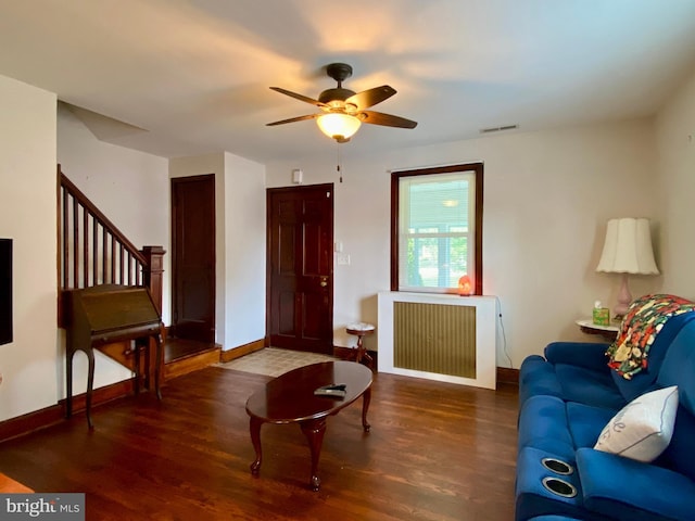 2634 Yorkway, Baltimore, MD 21222 - living room with radiator, wood finished floors, ceiling fan, and stairway