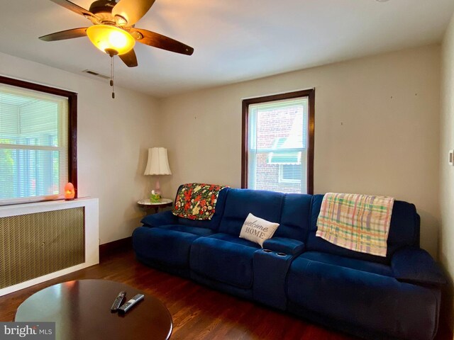 2634 Yorkway, Baltimore, MD 21222 - living area featuring radiator, wood finished floors, and ceiling fan