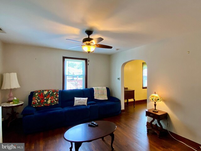 2634 Yorkway, Baltimore, MD 21222 - living area featuring arched walkways, ceiling fan, and wood finished floors