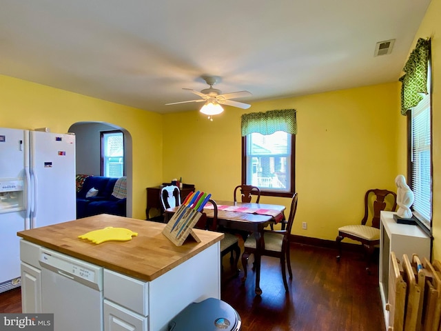 2634 Yorkway, Baltimore, MD 21222 - dining space featuring arched walkways, dark wood-style flooring, and ceiling fan