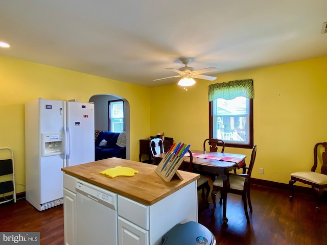 2634 Yorkway, Baltimore, MD 21222 - kitchen with butcher block countertops, white appliances, arched walkways, and plenty of natural light