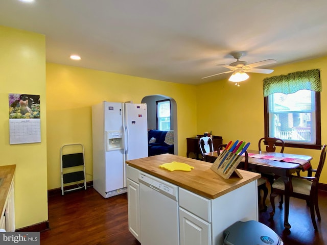 2634 Yorkway, Baltimore, MD 21222 - kitchen with white appliances, wooden counters, arched walkways, dark wood finished floors, and white cabinets