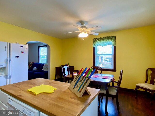 2634 Yorkway, Baltimore, MD 21222 - dining room with arched walkways, dark wood finished floors, and ceiling fan