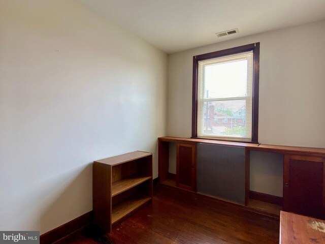 2634 Yorkway, Baltimore, MD 21222 - unfurnished room with dark wood-type flooring