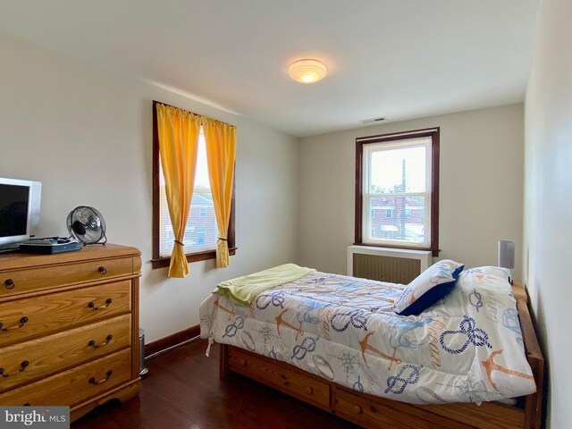2634 Yorkway, Baltimore, MD 21222 - bedroom with baseboards and dark wood finished floors