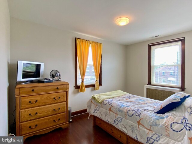 2634 Yorkway, Baltimore, MD 21222 - bedroom with dark wood-style floors and baseboards