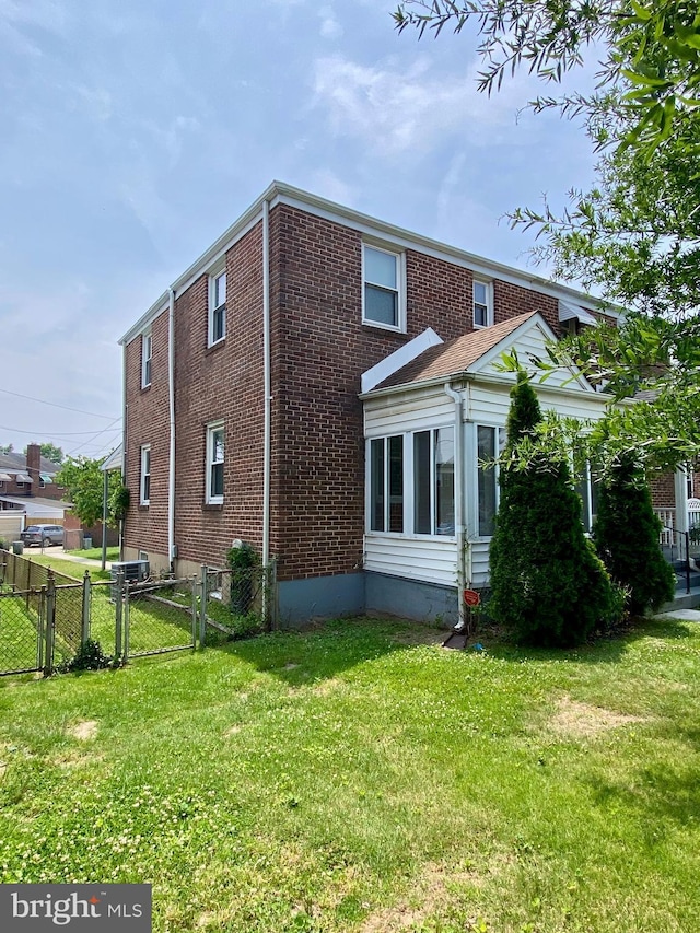2634 Yorkway, Baltimore, MD 21222 - rear view of house featuring brick siding and a gate
