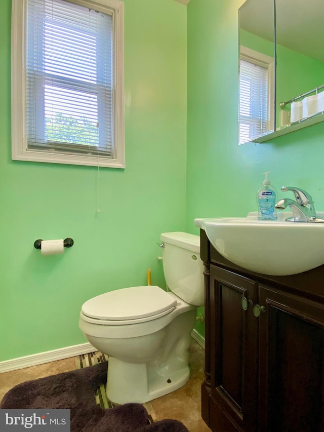 2634 Yorkway, Baltimore, MD 21222 - bathroom with plenty of natural light, vanity, tile patterned flooring, and curtained shower