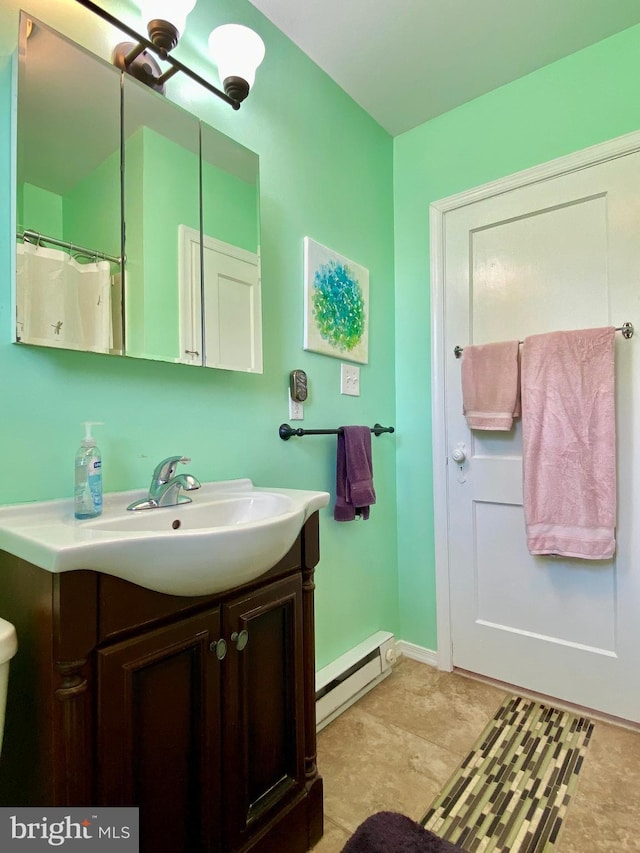2634 Yorkway, Baltimore, MD 21222 - full bath featuring a baseboard heating unit and vanity