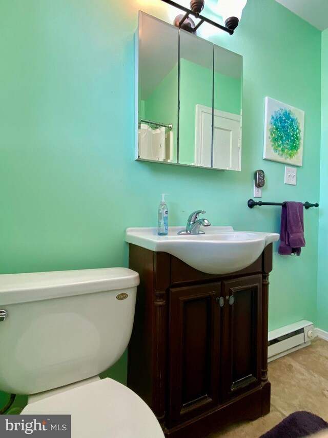 2634 Yorkway, Baltimore, MD 21222 - full bathroom featuring a baseboard radiator and vanity