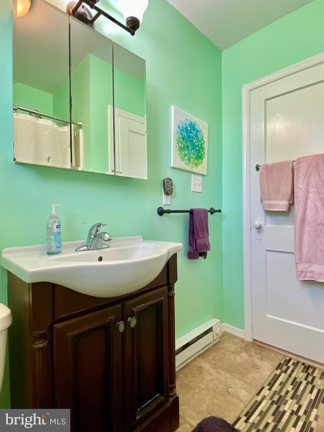 2634 Yorkway, Baltimore, MD 21222 - bathroom with baseboard heating and vanity
