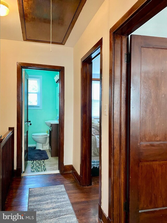 2634 Yorkway, Baltimore, MD 21222 - corridor featuring attic access and wood finished floors