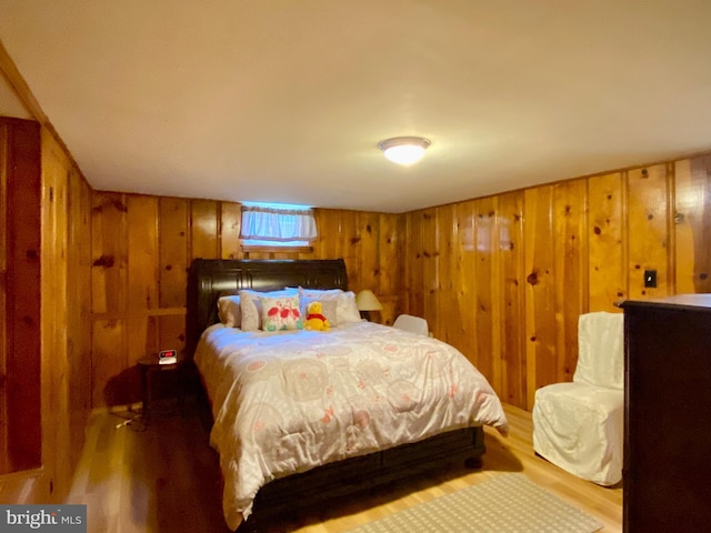 2634 Yorkway, Baltimore, MD 21222 - bedroom featuring wood finished floors and wooden walls