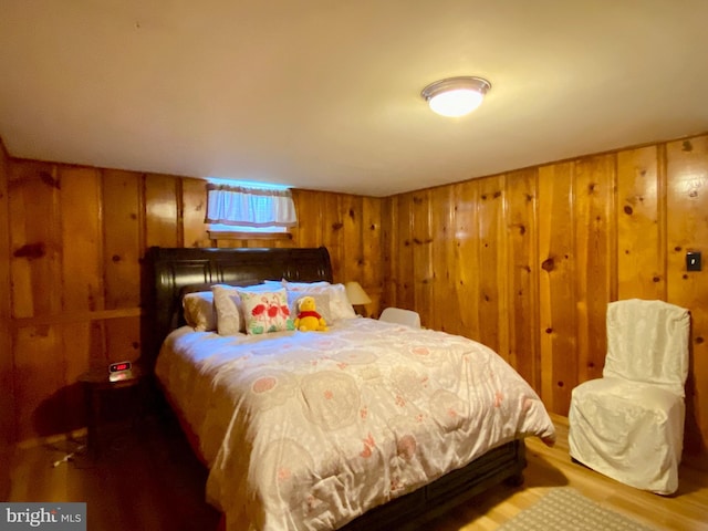 2634 Yorkway, Baltimore, MD 21222 - bedroom featuring wood finished floors and wooden walls