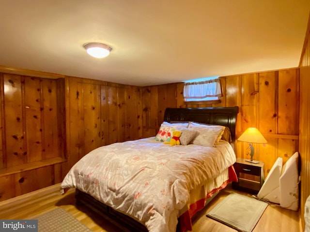 2634 Yorkway, Baltimore, MD 21222 - bedroom featuring wood finished floors and wooden walls