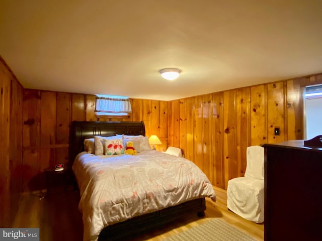 2634 Yorkway, Baltimore, MD 21222 - bedroom featuring wood finished floors and wooden walls