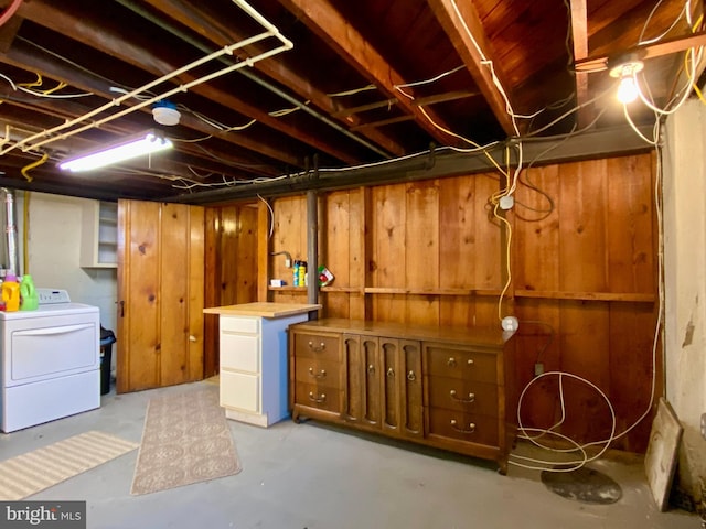 2634 Yorkway, Baltimore, MD 21222 - unfinished basement featuring washer / dryer and wood walls
