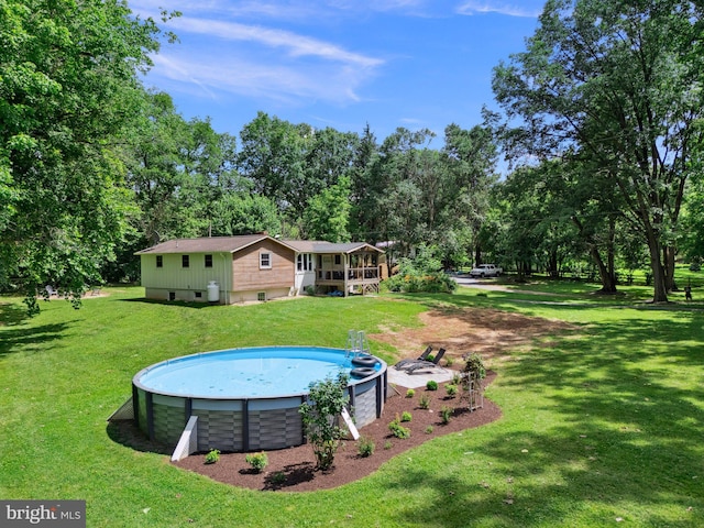 1945 Shenandoah Springs Ln, Elkton, VA 22827 - outdoor pool with a yard and view of wooded area