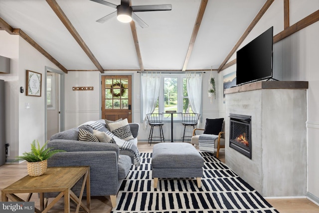 1945 Shenandoah Springs Ln, Elkton, VA 22827 - living room featuring a ceiling fan, a tiled fireplace, and wood finished floors