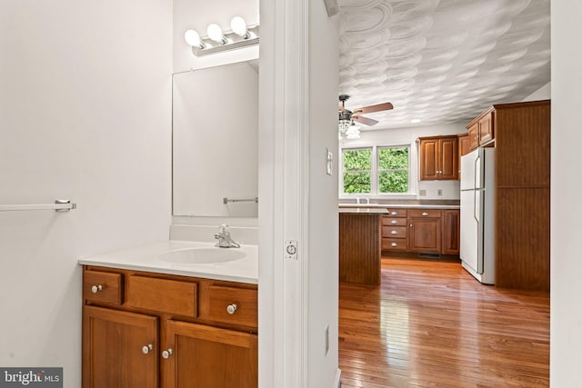 421 Old Stage Rd, Lewisberry, PA 17339 - bathroom featuring vanity, ceiling fan, and wood finished floors