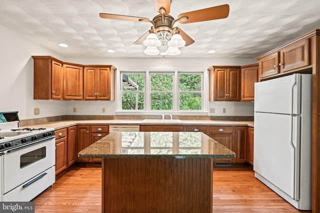 421 Old Stage Rd, Lewisberry, PA 17339 - kitchen with white appliances, recessed lighting, a ceiling fan, brown cabinets, and a kitchen island