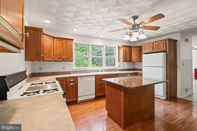 421 Old Stage Rd, Lewisberry, PA 17339 - kitchen featuring white appliances, ceiling fan, brown cabinetry, light wood-style floors, and recessed lighting