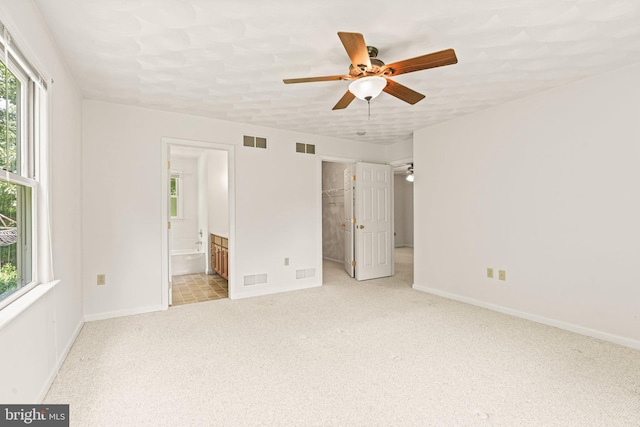 421 Old Stage Rd, Lewisberry, PA 17339 - unfurnished bedroom with multiple windows, carpet floors, ensuite bathroom, and a spacious closet