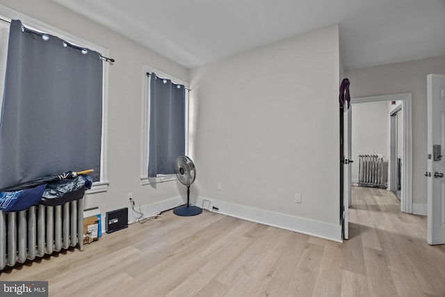 400 E Vernon Rd, Philadelphia, PA 19119 - unfurnished bedroom with light wood-style flooring and radiator heating unit