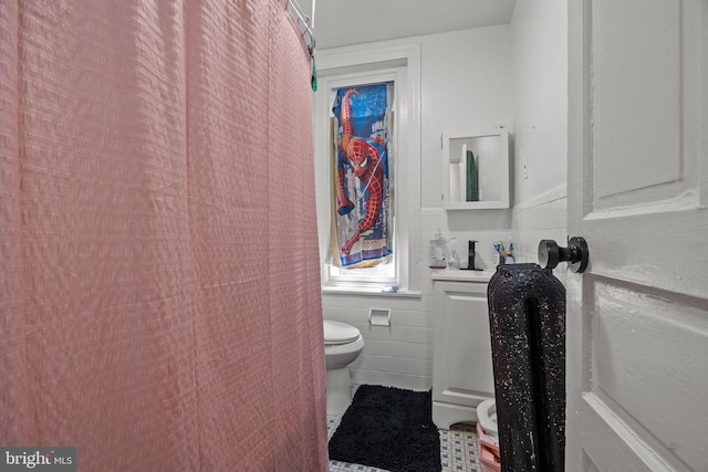 400 E Vernon Rd, Philadelphia, PA 19119 - full bath with tile walls, a wainscoted wall, and vanity
