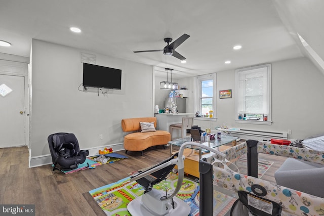 400 E Vernon Rd, Philadelphia, PA 19119 - living area with wood finished floors, ceiling fan, recessed lighting, and a baseboard heating unit