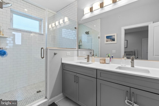 1837 N Palethorp St, Philadelphia, PA 19122 - full bath with double vanity, a shower stall, and marble look tile flooring