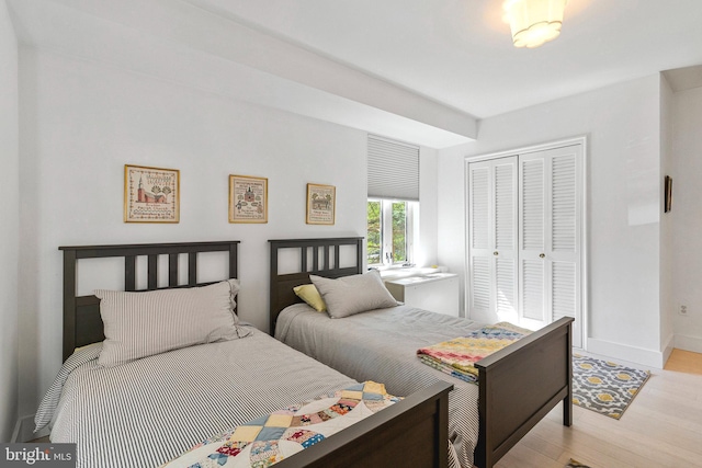 4301 Massachusetts Ave NW Unit A212, Washington, DC 20016 - bedroom with a closet and wood finished floors