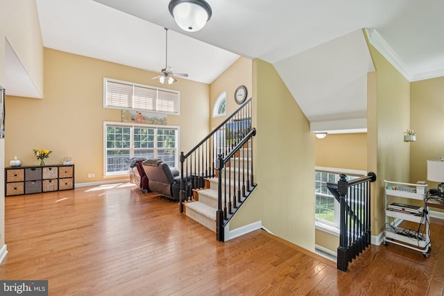 1340 Mountain View Rd, Stafford, VA 22554 - stairs featuring wood finished floors, ceiling fan, and crown molding
